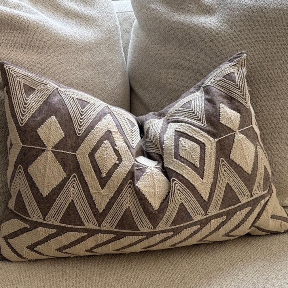 Indaba Geometric embroidered 16 x 24 pillow. Comes with feather insert